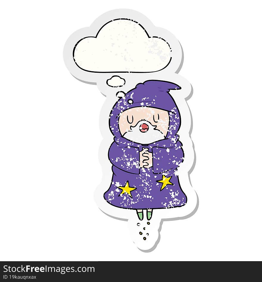 cartoon floating wizard with thought bubble as a distressed worn sticker