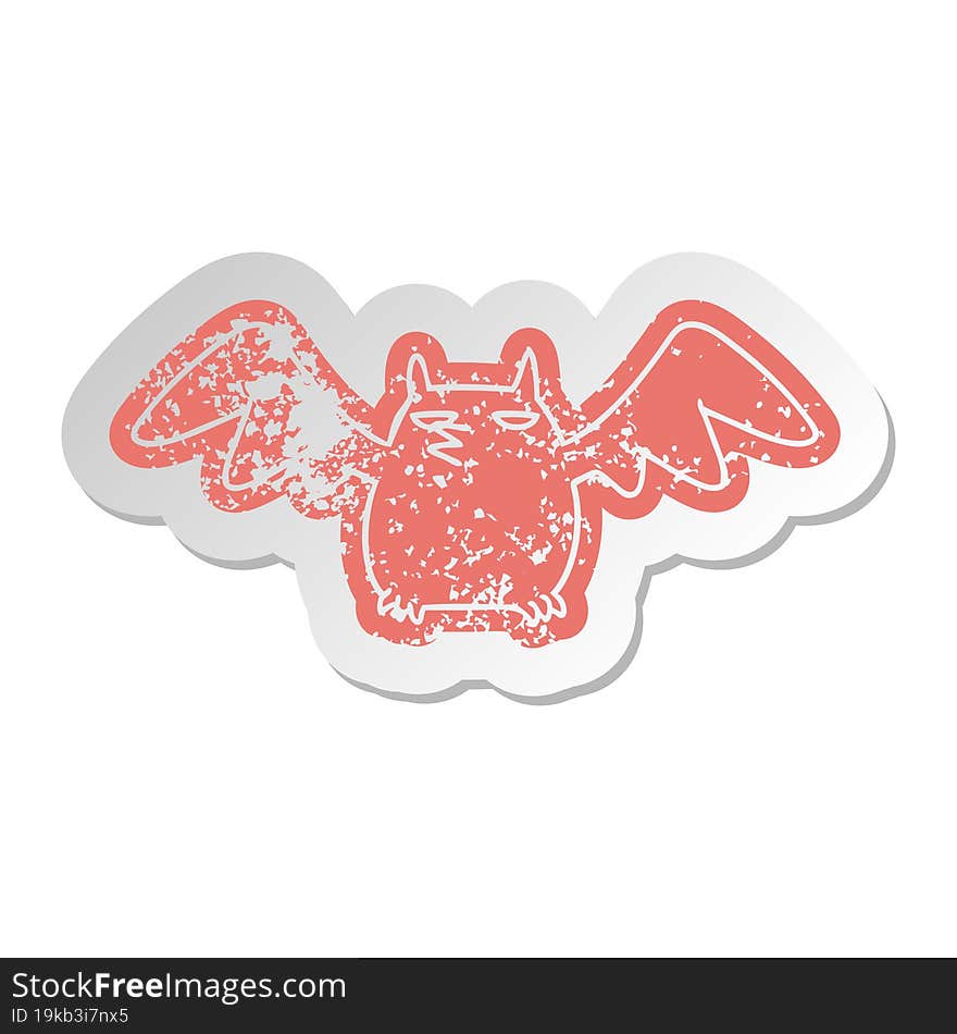 distressed old sticker of a night bat