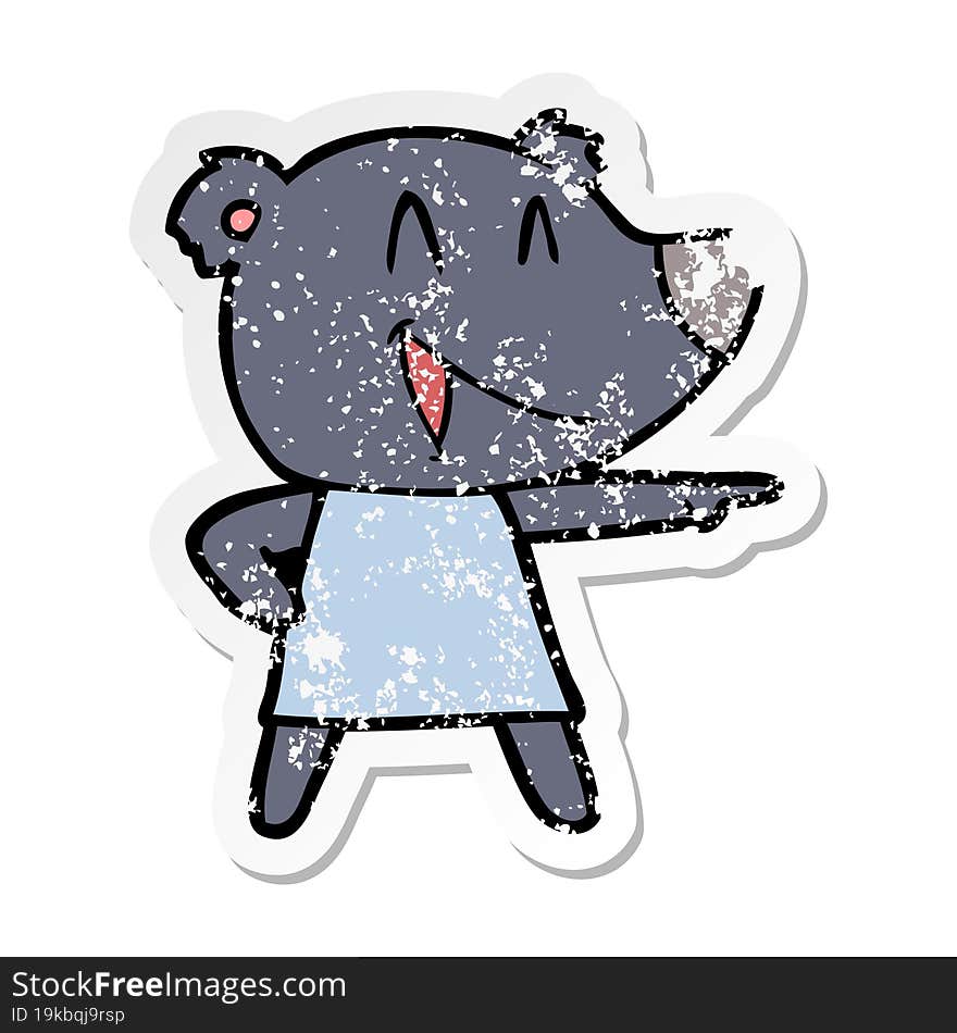 distressed sticker of a cartoon bear in dress laughing and pointing