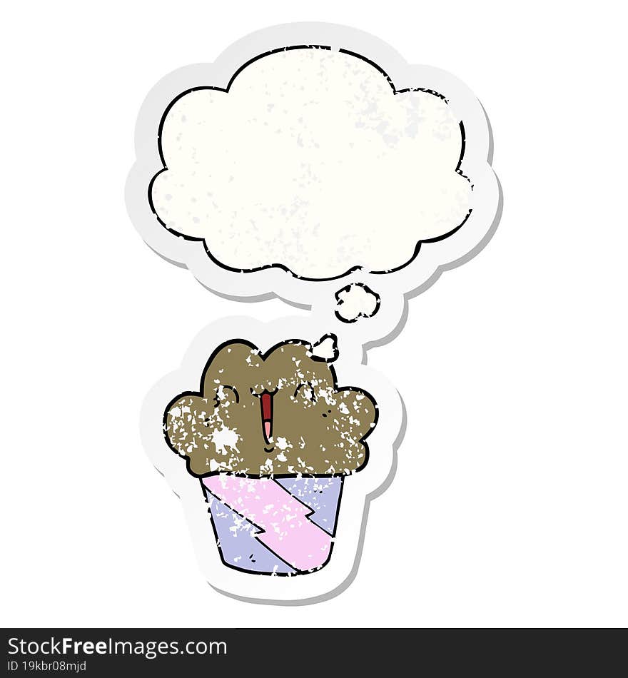 cartoon cupcake with face with thought bubble as a distressed worn sticker