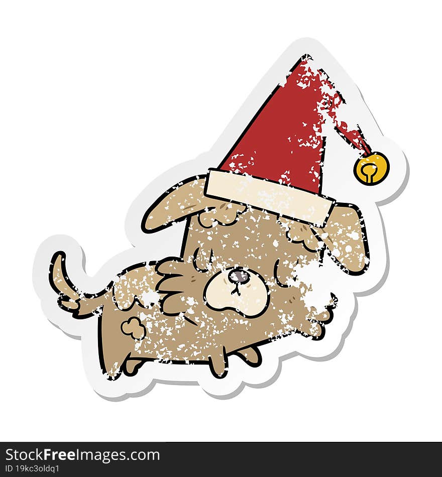 Distressed Sticker Of A Cartoon Dog In Christmas Hat