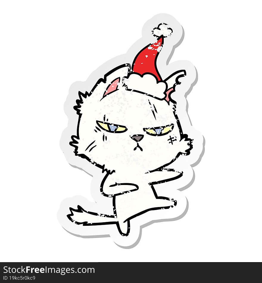 tough distressed sticker cartoon of a cat wearing santa hat