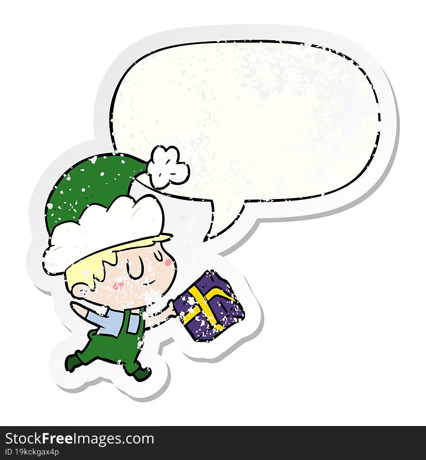 cartoon happy christmas elf and present and speech bubble distressed sticker