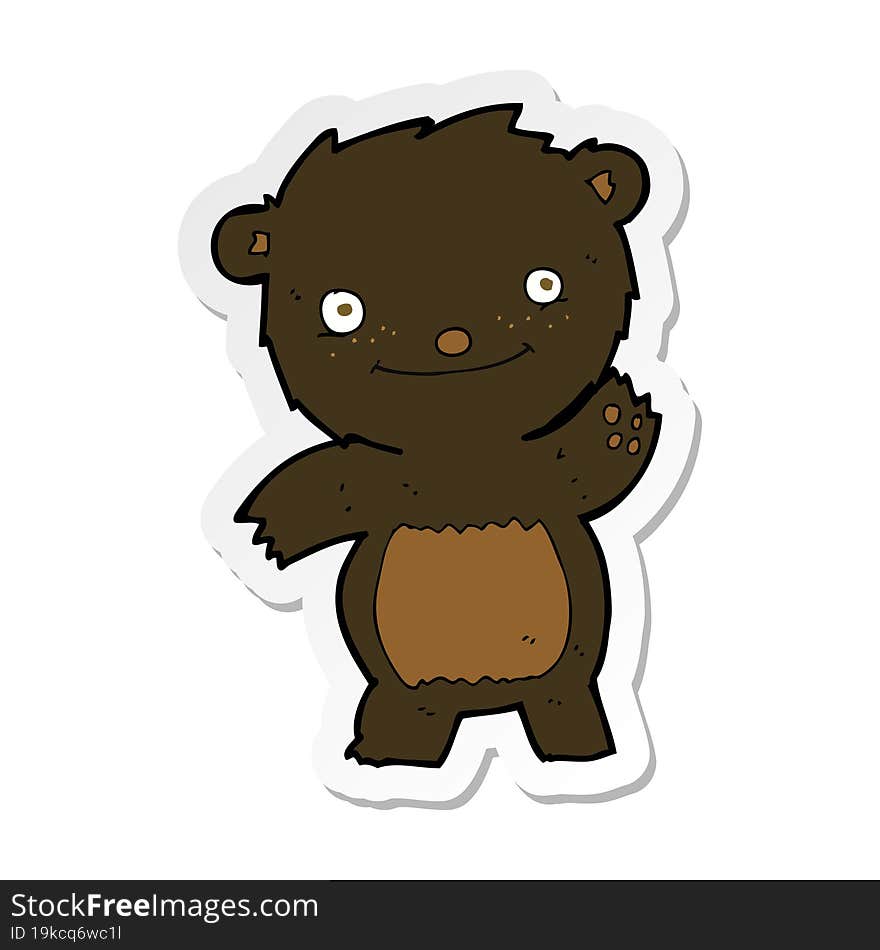 sticker of a cartoon waving black bear cub