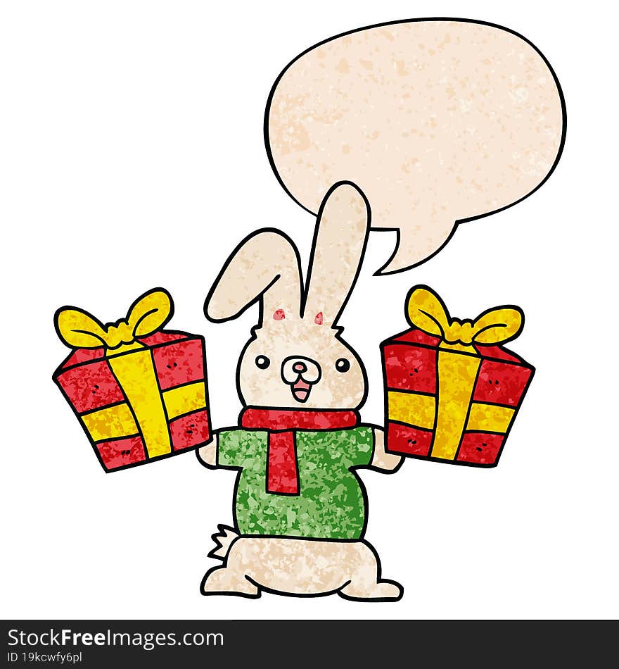 cartoon rabbit with christmas presents with speech bubble in retro texture style. cartoon rabbit with christmas presents with speech bubble in retro texture style