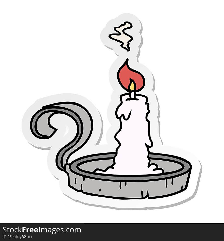 sticker cartoon doodle of a candle holder and lit candle