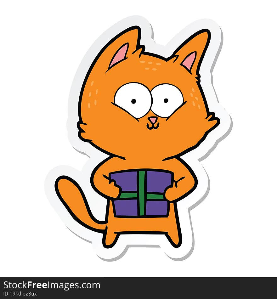 sticker of a cartoon cat holding christmas present