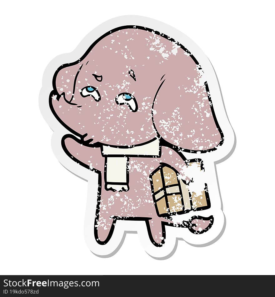 distressed sticker of a cartoon elephant with gift remembering