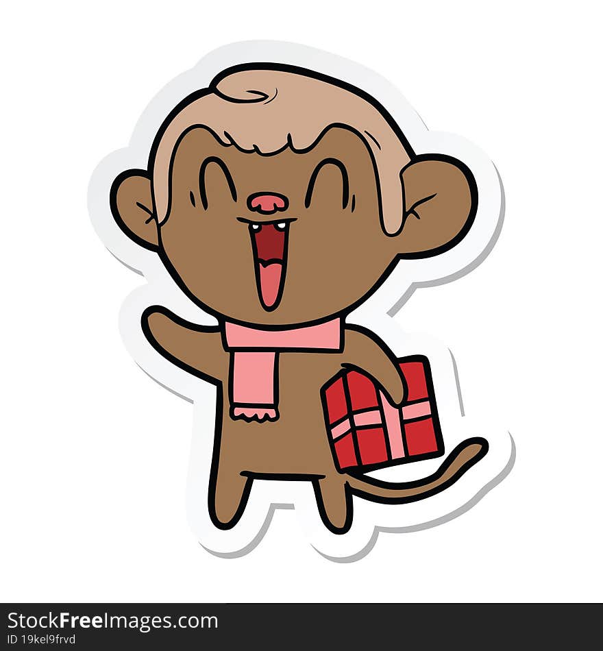 sticker of a cartoon laughing monkey