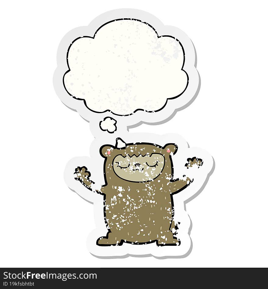 cute cartoon bear and thought bubble as a distressed worn sticker