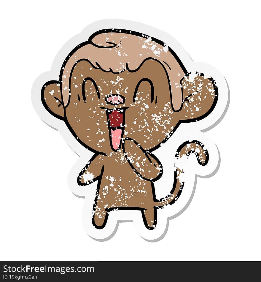 distressed sticker of a cartoon laughing monkey