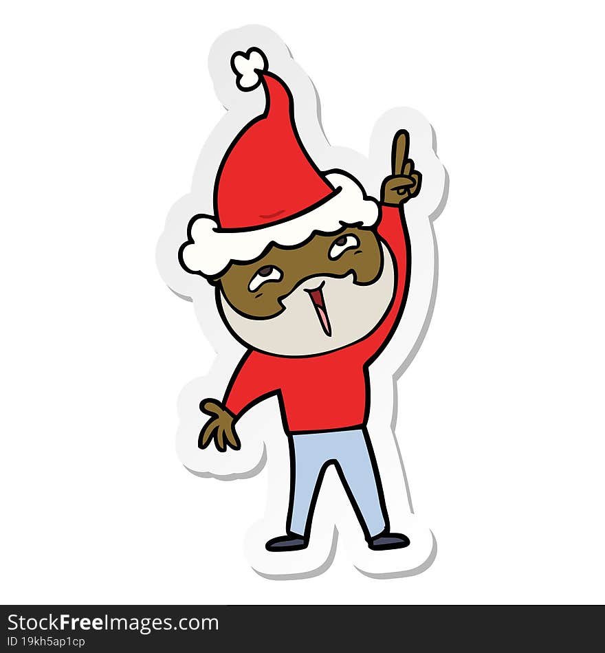 sticker cartoon of a happy bearded man wearing santa hat