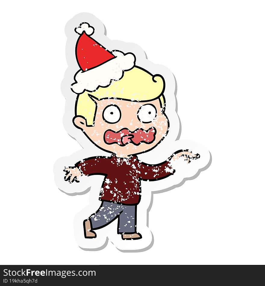 distressed sticker cartoon of a stressed out pointing wearing santa hat