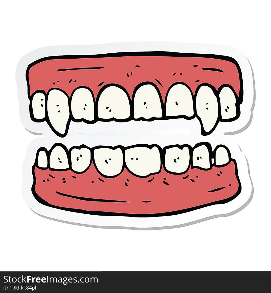 sticker of a cartoon vampire teeth