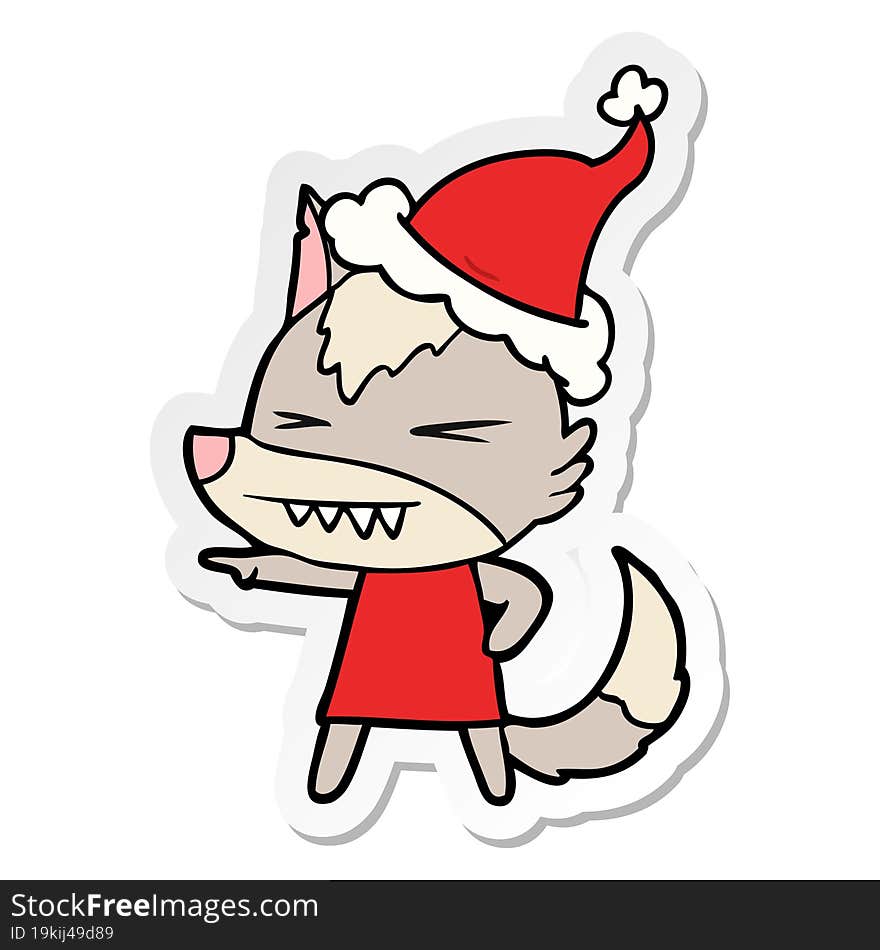 angry wolf sticker cartoon of a wearing santa hat