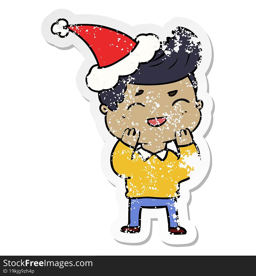 distressed sticker cartoon of a man laughing wearing santa hat