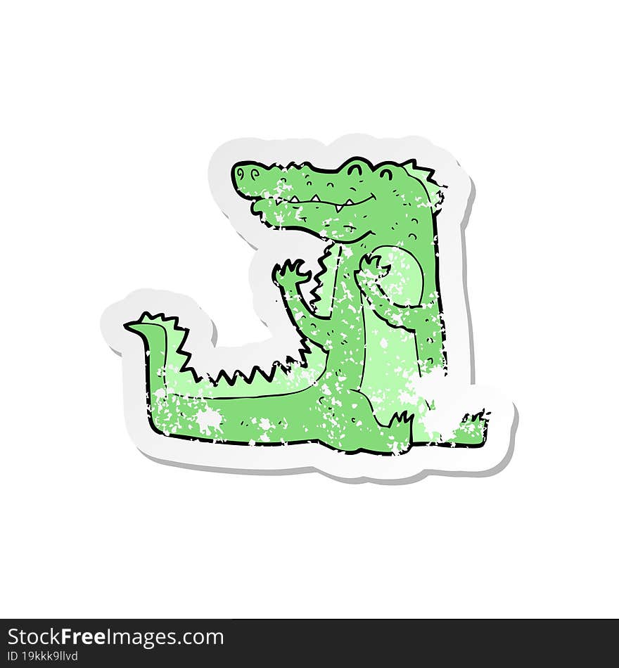 retro distressed sticker of a cartoon crocodile