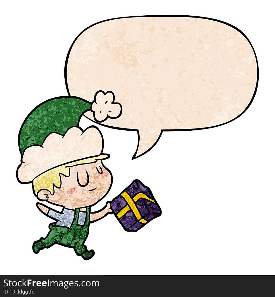 cartoon happy christmas elf with present with speech bubble in retro texture style. cartoon happy christmas elf with present with speech bubble in retro texture style