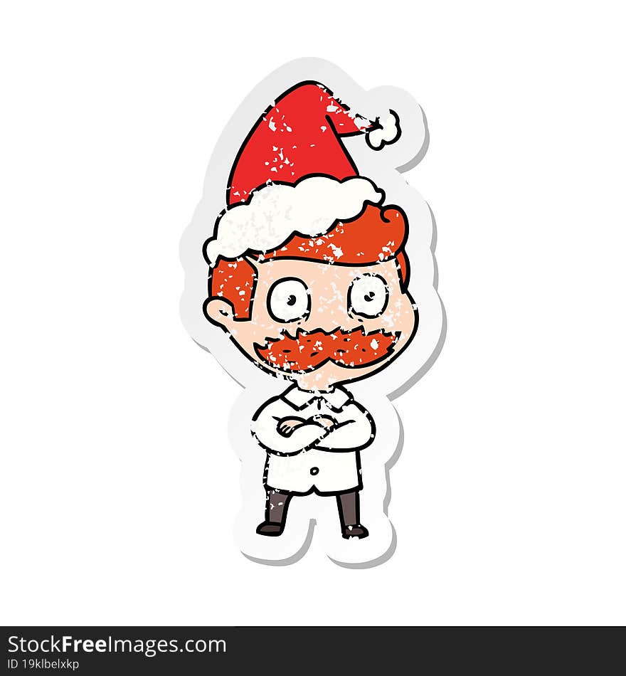 distressed sticker cartoon of a man with mustache shocked wearing santa hat