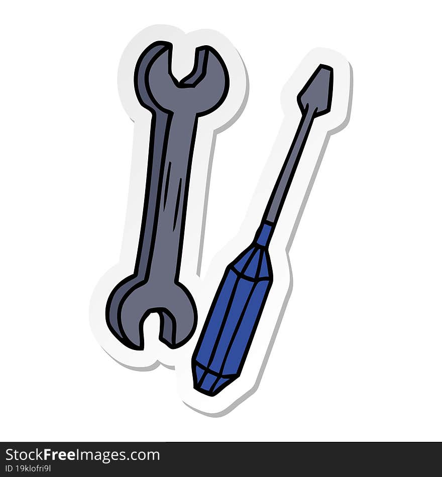 hand drawn sticker cartoon doodle of a spanner and a screwdriver