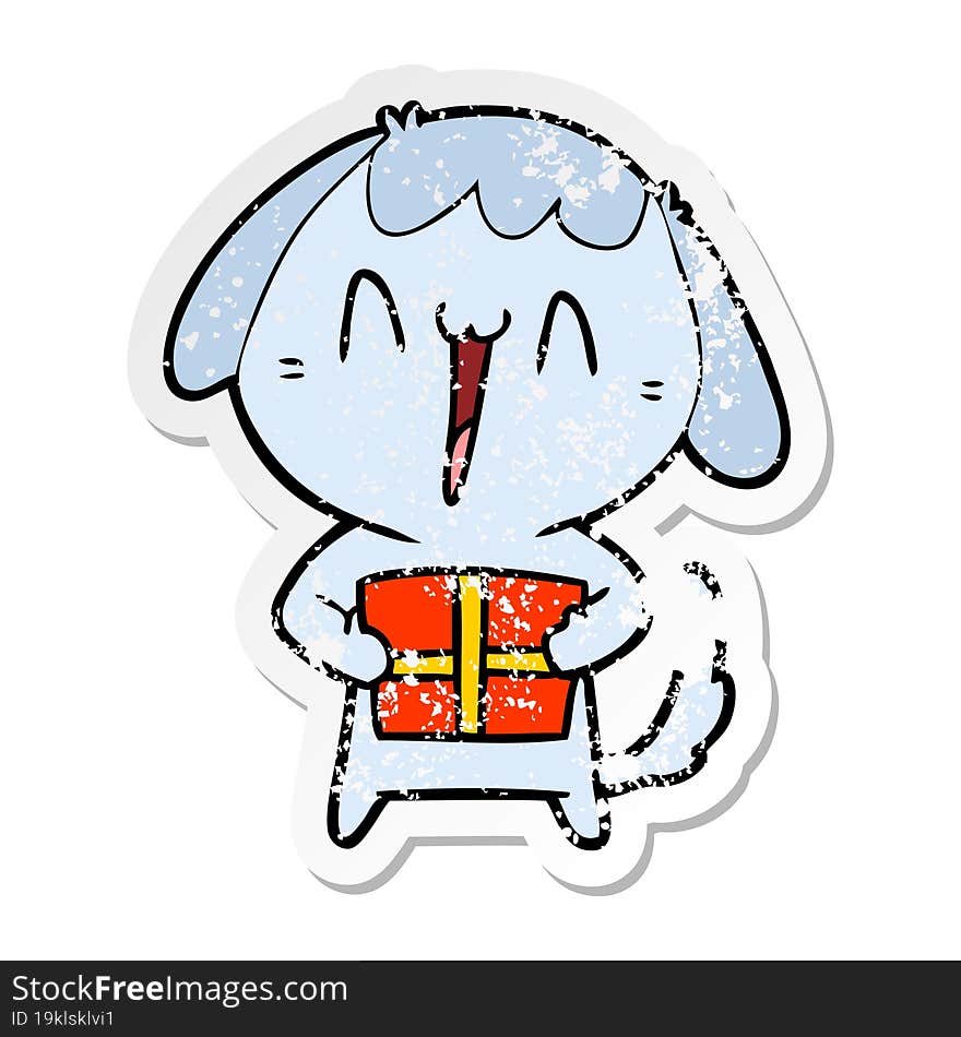 distressed sticker of a cute cartoon dog with christmas present