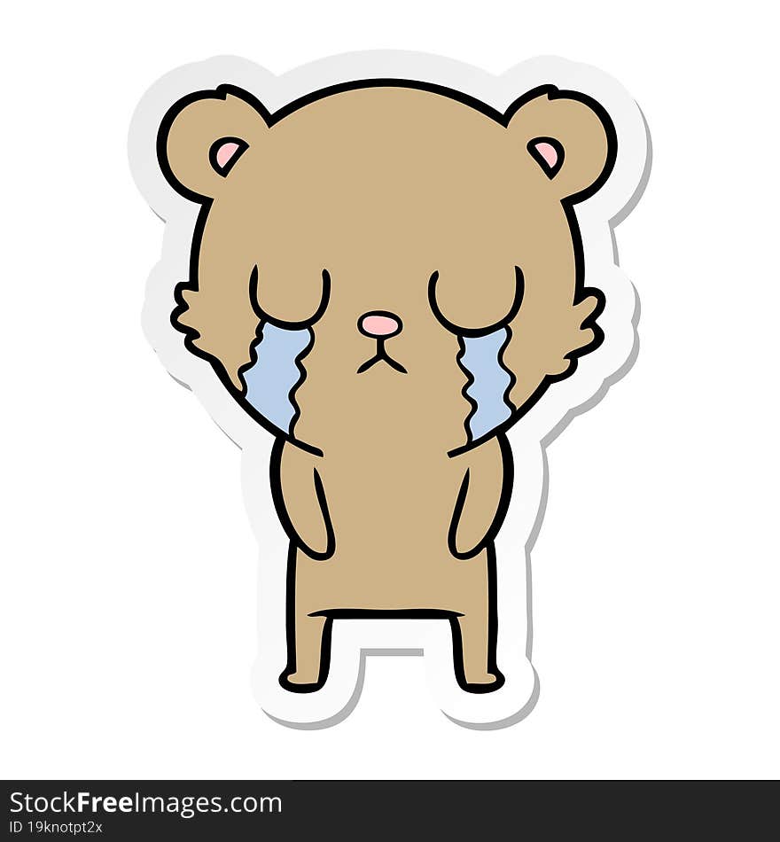 distressed sticker of a cartoon bear crying