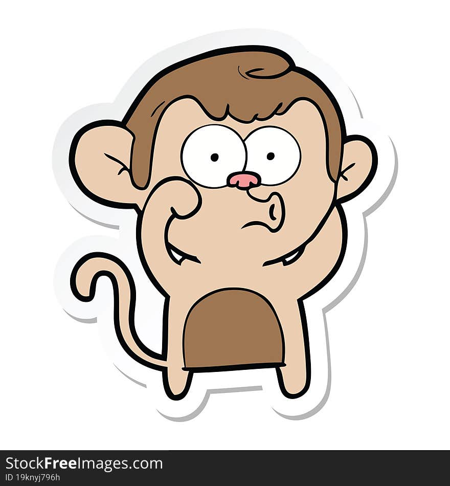 sticker of a cartoon hooting monkey