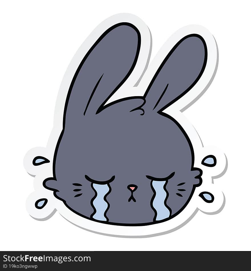 sticker of a cartoon rabbit face crying