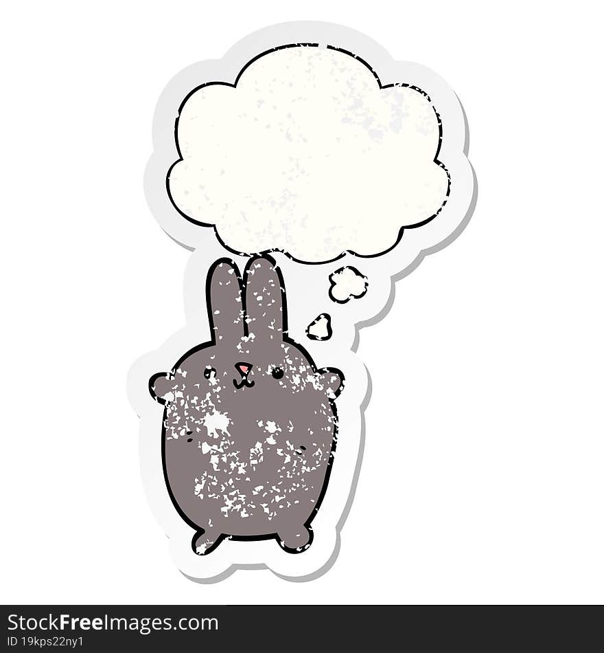 cartoon rabbit with thought bubble as a distressed worn sticker