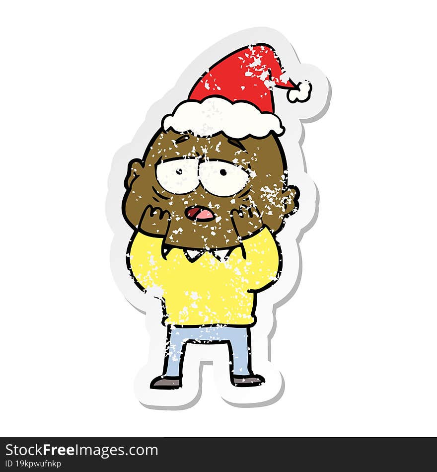 distressed sticker cartoon of a tired bald man wearing santa hat