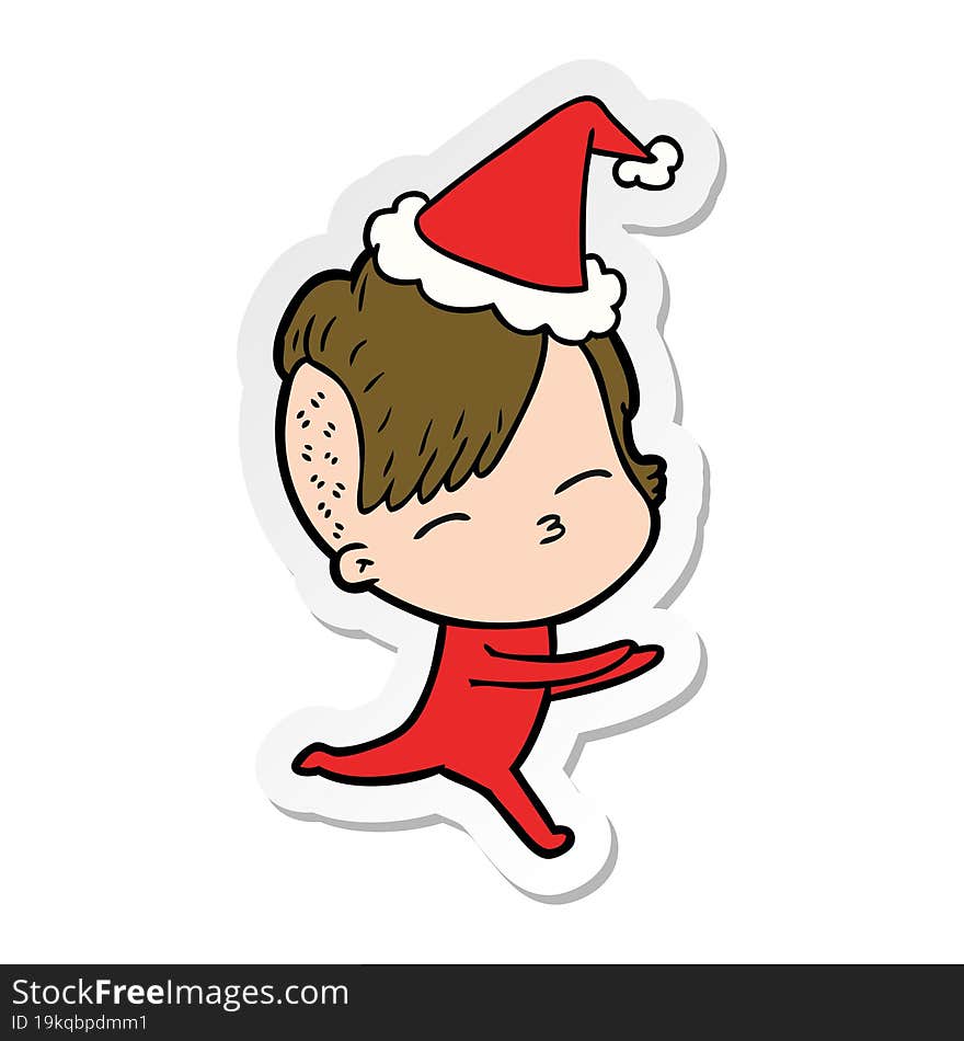 sticker cartoon of a girl in onesie wearing santa hat