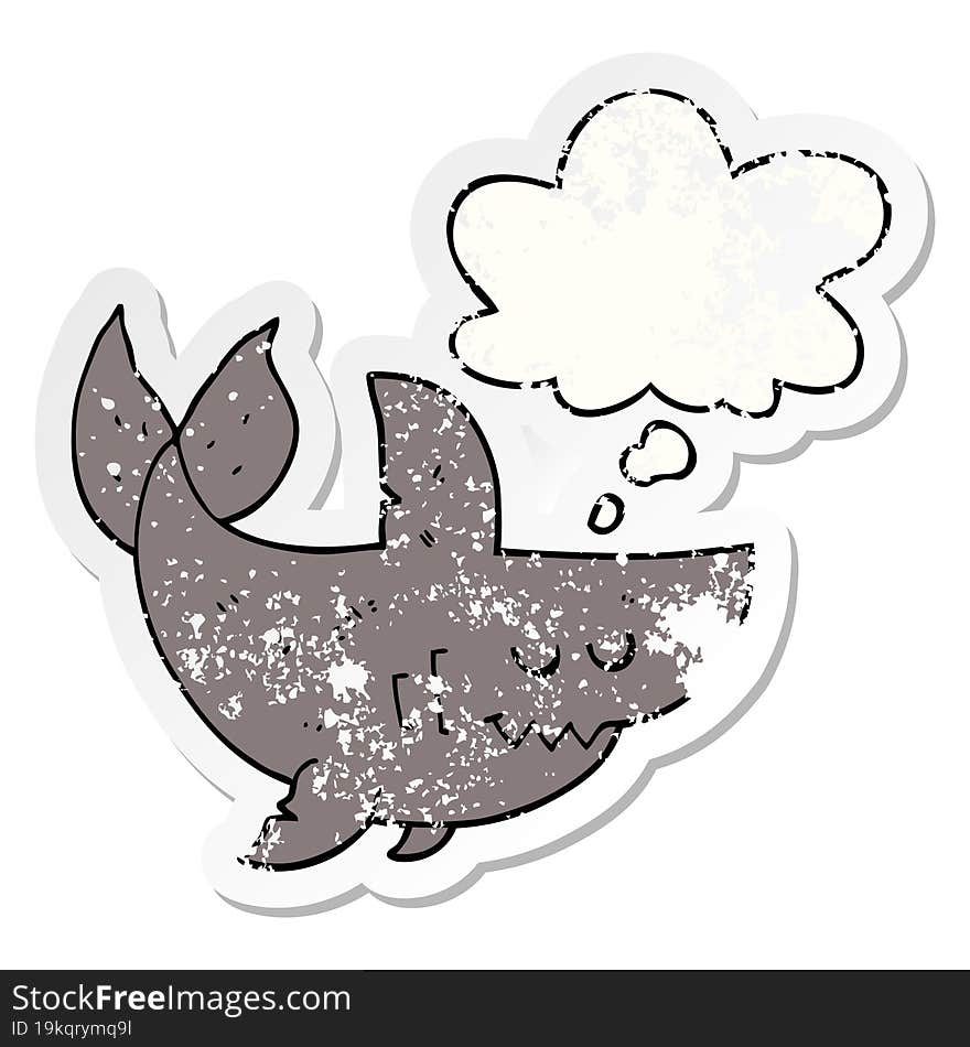 cartoon shark and thought bubble as a distressed worn sticker