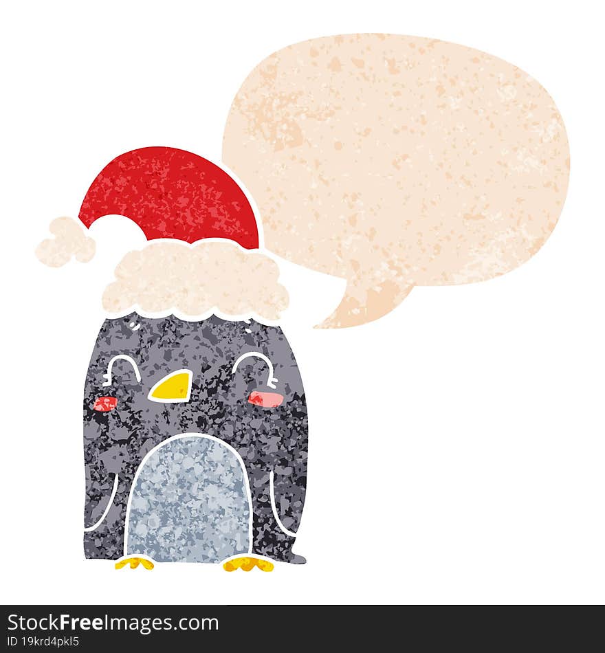 cute christmas penguin and speech bubble in retro textured style