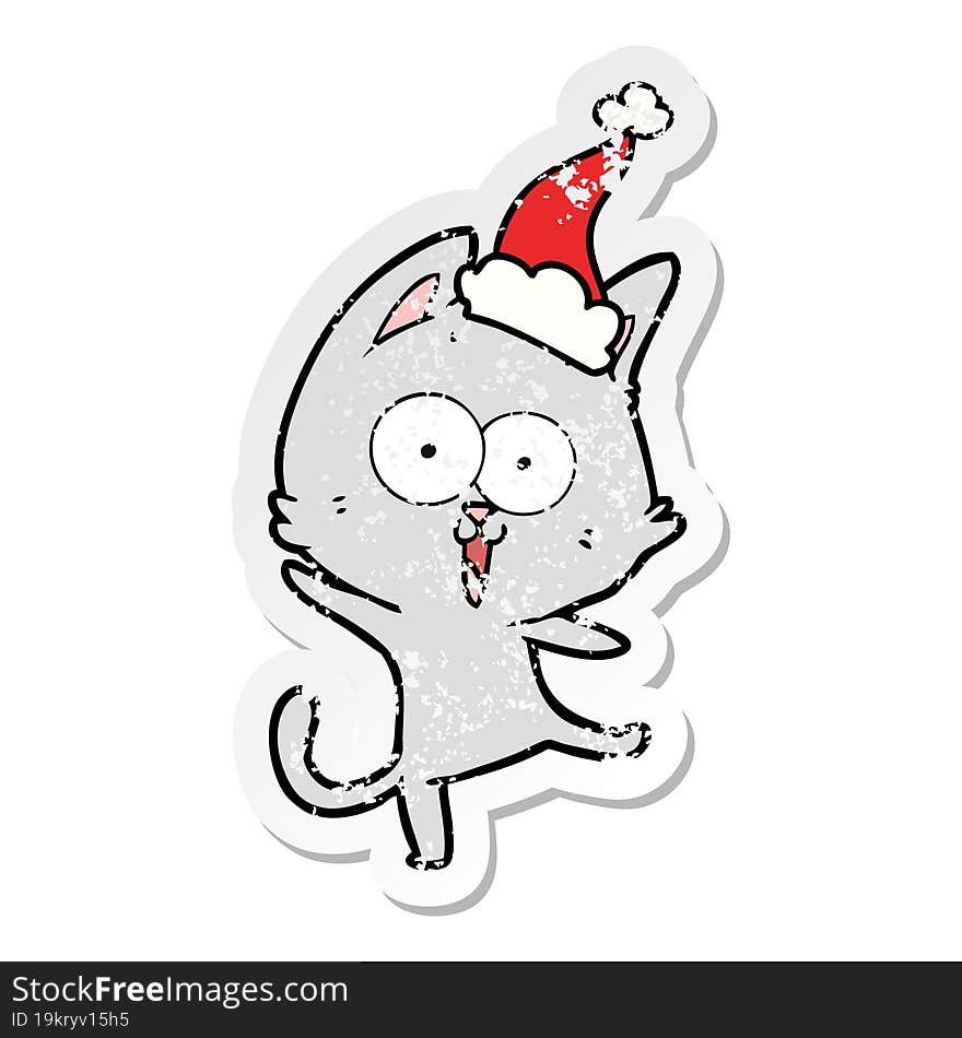 funny distressed sticker cartoon of a cat wearing santa hat