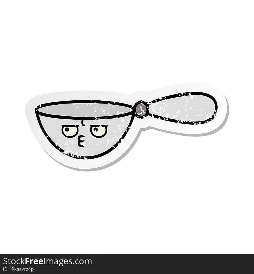 distressed sticker of a cute cartoon measuring spoon