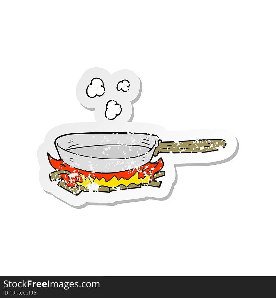 retro distressed sticker of a cartoon frying pan on fire