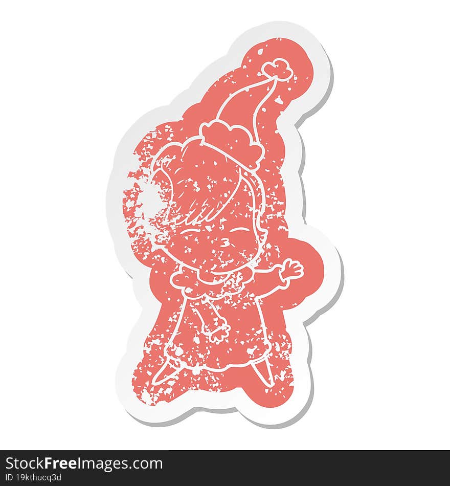 cartoon distressed sticker of a squinting girl wearing santa hat