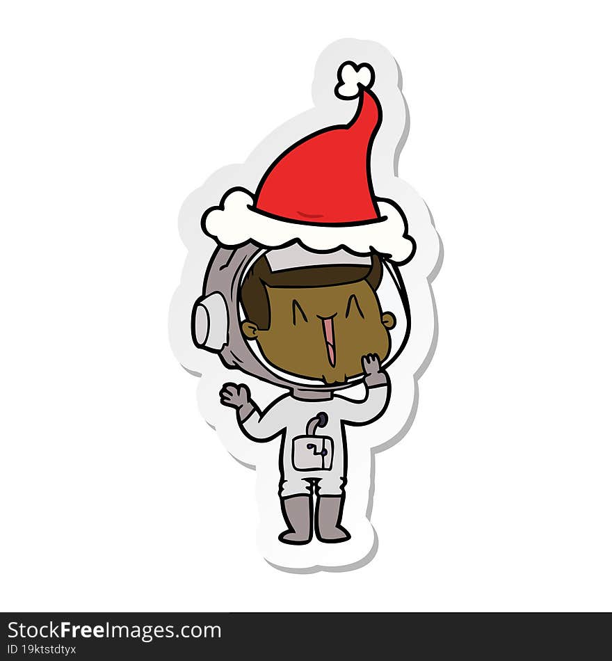 laughing sticker cartoon of a astronaut wearing santa hat