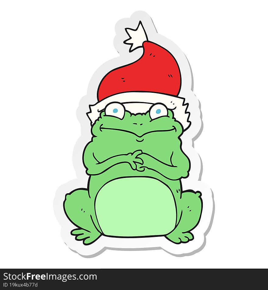 sticker of a cartoon frog wearing christmas hat