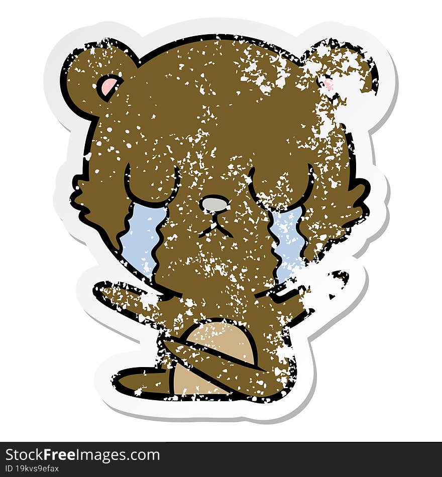 distressed sticker of a crying cartoon bear