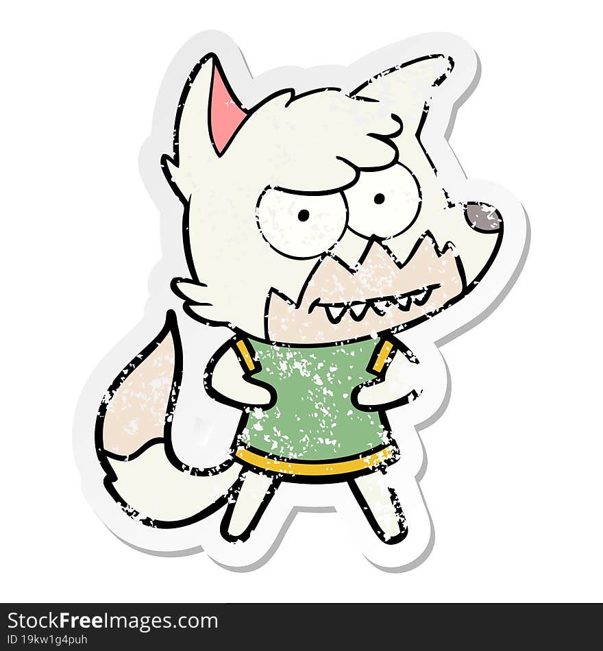 distressed sticker of a cartoon grinning fox