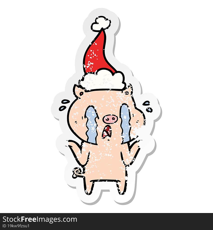 crying pig distressed sticker cartoon of a wearing santa hat