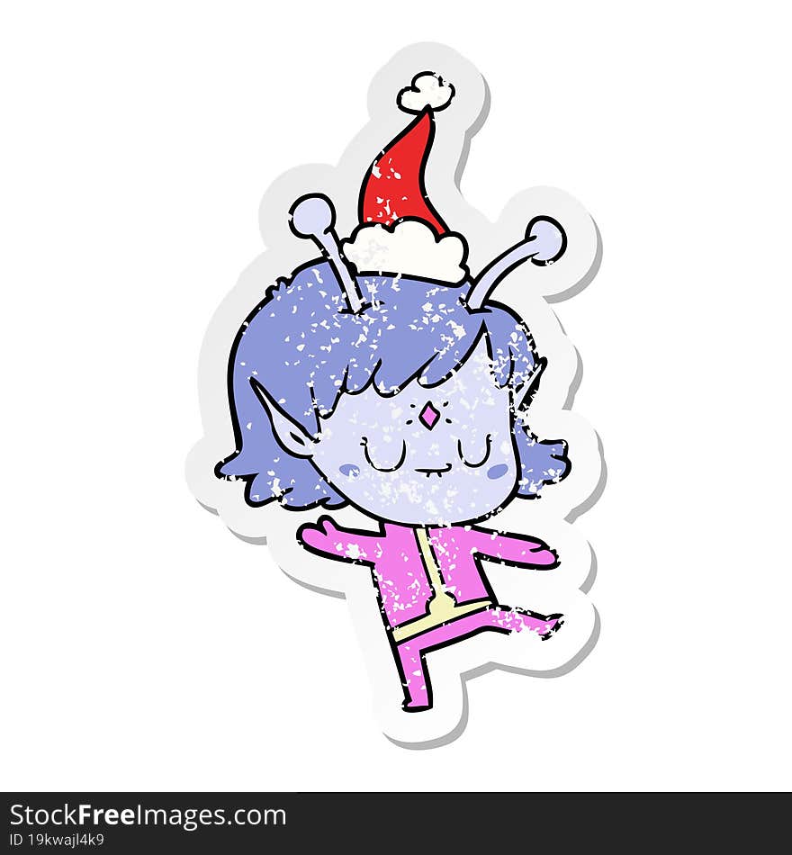 distressed sticker cartoon of a alien girl wearing santa hat