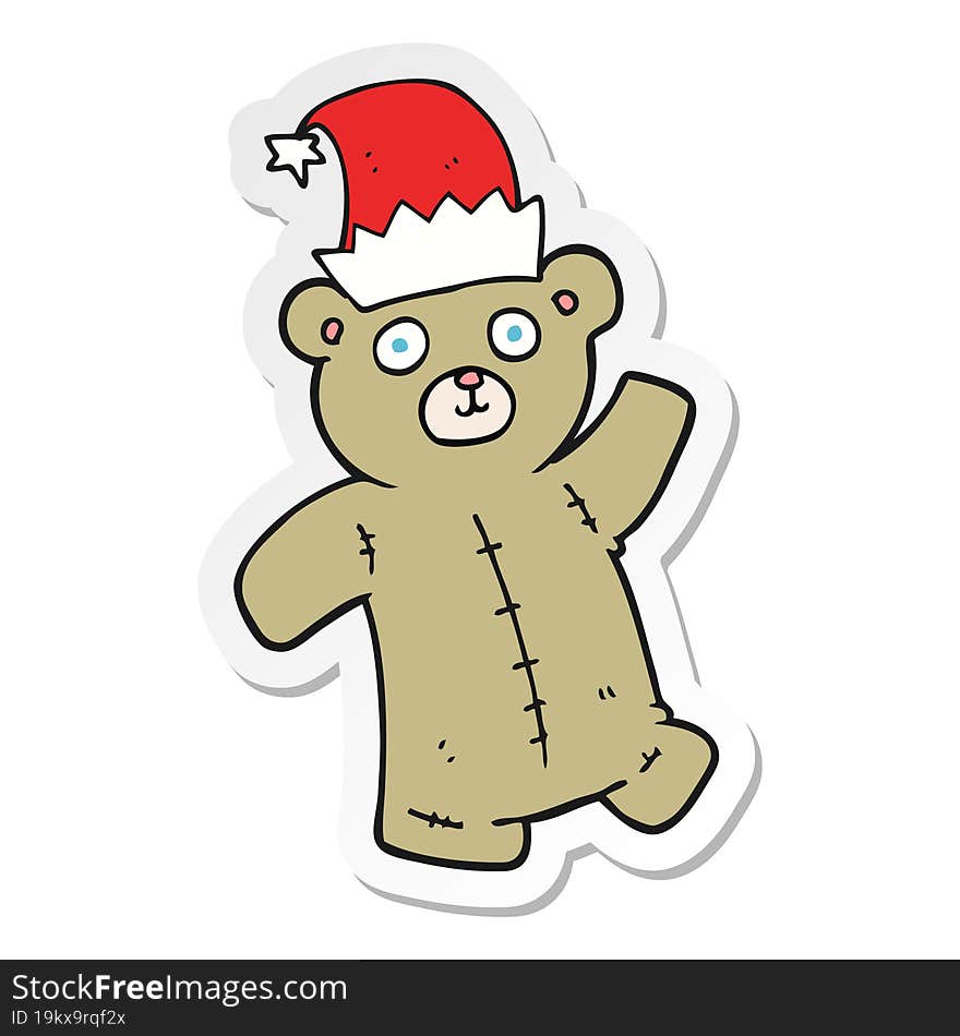 sticker of a cartoon teddy bear wearing christmas hat