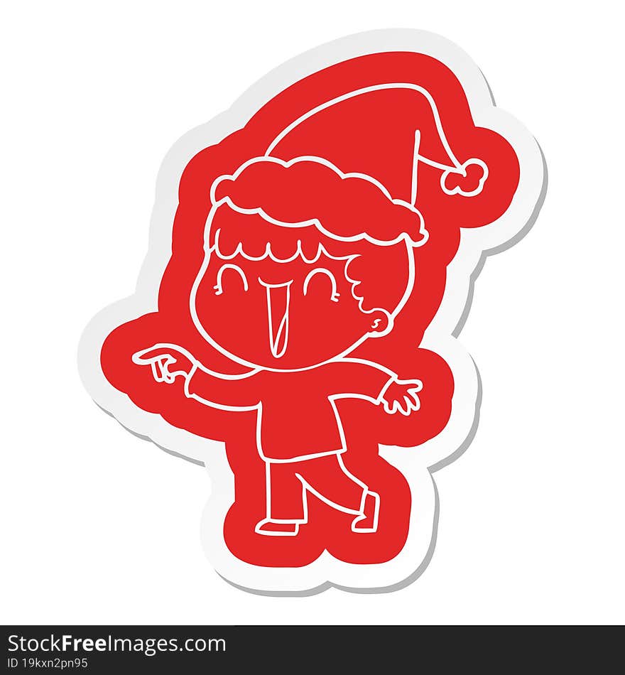 laughing quirky cartoon  sticker of a man pointing wearing santa hat