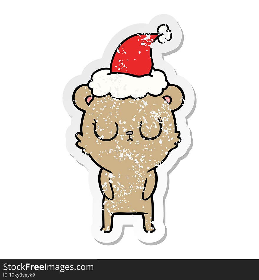 peaceful distressed sticker cartoon of a bear wearing santa hat