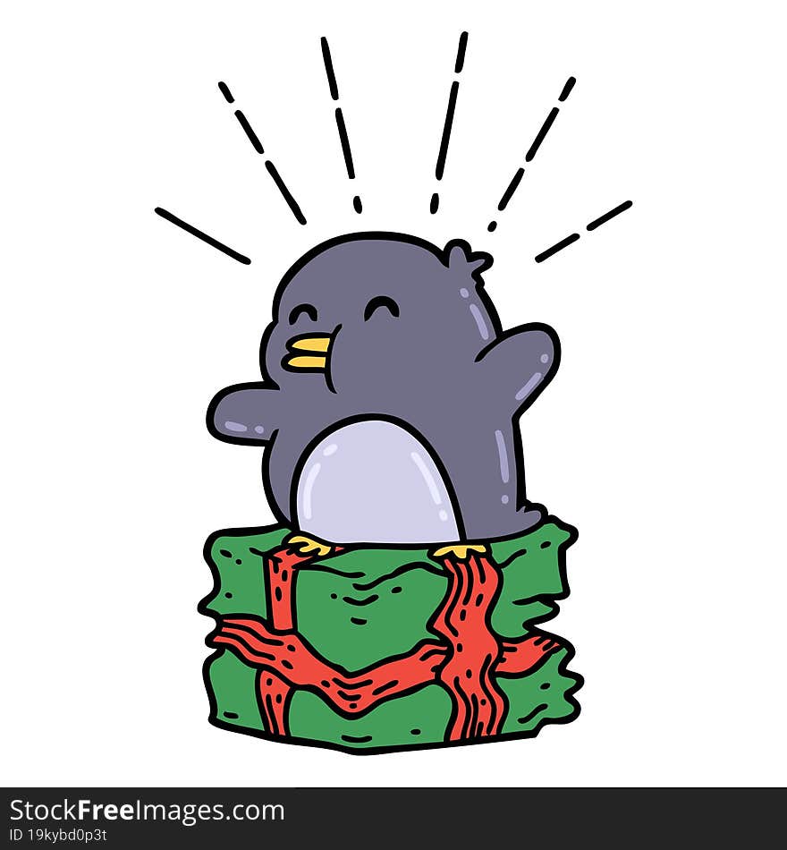 traditional tattoo style penguin sitting on present