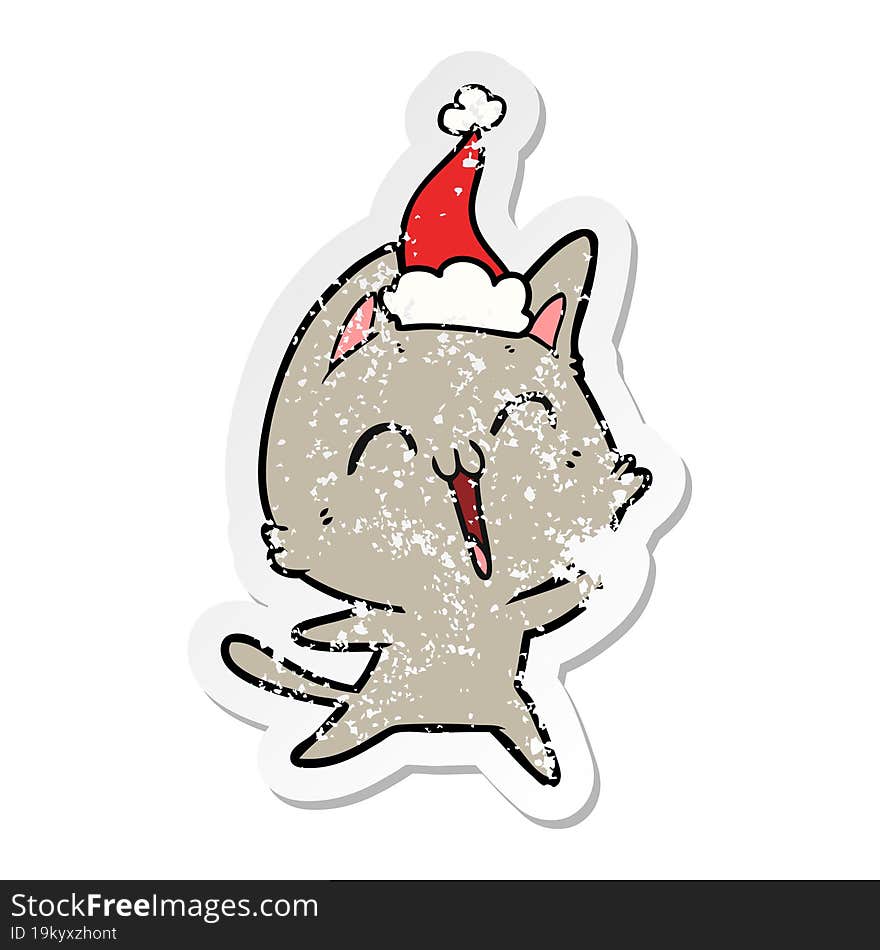 happy distressed sticker cartoon of a cat wearing santa hat