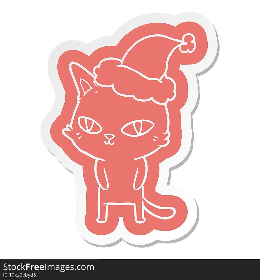 cartoon  sticker of a cat with bright eyes wearing santa hat