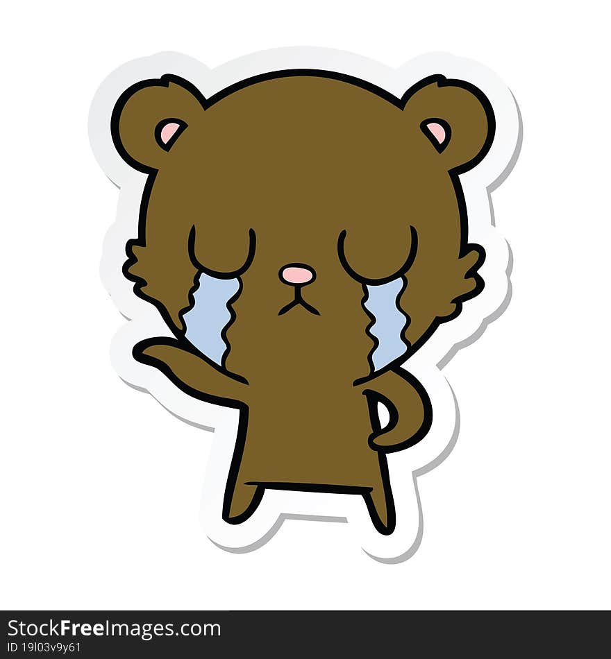 sticker of a crying cartoon bear